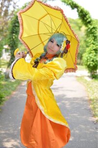 Rating: Safe Score: 0 Tags: 1girl blurry blurry_background depth_of_field dress flower hair_flower hair_ornament holding holding_umbrella kanaria looking_at_viewer outdoors parasol raincoat smile solo umbrella User: admin