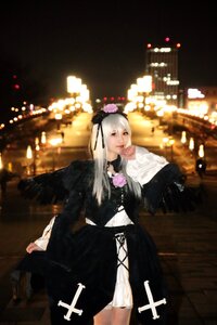 Rating: Safe Score: 0 Tags: 1girl black_dress blurry_background dress flower frills long_hair long_sleeves sitting solo suigintou User: admin