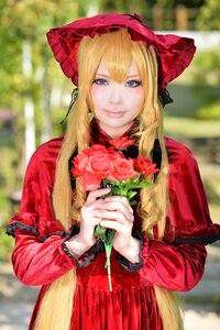 Rating: Safe Score: 0 Tags: 1girl bangs blonde_hair blue_eyes blurry blurry_background bonnet bouquet capelet depth_of_field dress flower holding holding_flower lips long_hair long_sleeves looking_at_viewer photo red_capelet red_dress red_flower rose shinku smile solo upper_body User: admin