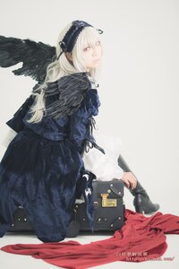 Rating: Safe Score: 0 Tags: 1girl dress feathered_wings long_hair long_sleeves ribbon solo suigintou wings User: admin