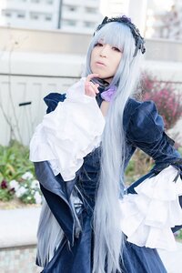 Rating: Safe Score: 0 Tags: 1girl bangs blurry blurry_background blurry_foreground closed_mouth depth_of_field dress gothic_lolita hairband lolita_fashion long_hair long_sleeves looking_at_viewer photo red_eyes solo standing suigintou User: admin