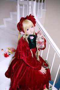 Rating: Safe Score: 0 Tags: 1girl blonde_hair blue_eyes bonnet bow dress flower long_hair long_sleeves looking_at_viewer photo red_dress rose shinku solo User: admin