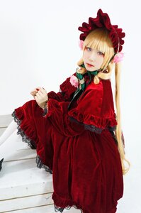 Rating: Safe Score: 0 Tags: 1girl bangs blonde_hair blue_eyes bonnet bow capelet dress flower frills lips long_hair long_sleeves looking_at_viewer nail_polish red_capelet red_dress rose shinku solo very_long_hair User: admin