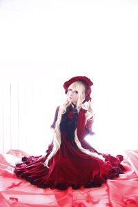 Rating: Safe Score: 0 Tags: 1girl blonde_hair blue_eyes bonnet dress flower long_hair long_sleeves red_dress rose shinku sitting solo User: admin