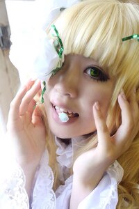Rating: Safe Score: 0 Tags: 1girl bangs blonde_hair face green_eyes hair_ornament hands kirakishou lace lips looking_at_viewer realistic solo User: admin