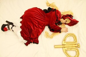 Rating: Safe Score: 0 Tags: 1girl blonde_hair bonnet bow doll dress flower frills high_heels long_hair lying on_side red_dress red_flower red_rose rose shinku sleeping solo User: admin