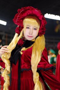 Rating: Safe Score: 0 Tags: 1girl bangs blonde_hair blue_eyes blurry blurry_background bonnet depth_of_field dress flower lips long_hair looking_at_viewer photo red_dress red_flower red_rose rose shinku solo User: admin