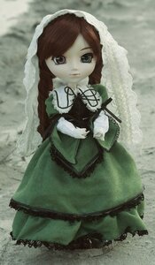 Rating: Safe Score: 0 Tags: 1girl brown_hair doll dress frills full_body green_dress long_hair long_sleeves looking_at_viewer solo standing suiseiseki very_long_hair User: admin