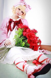 Rating: Safe Score: 0 Tags: 1girl blonde_hair bouquet bow dress flower frills hinaichigo lace lips lying red_flower ribbon rose short_hair solo User: admin