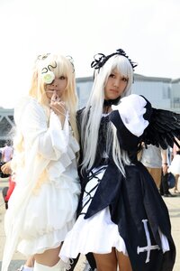 Rating: Safe Score: 0 Tags: 2girls 3d blonde_hair blurry depth_of_field dress frills long_hair multiple_cosplay multiple_girls photo standing suigintou tagme white_hair wings User: admin