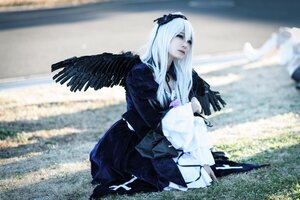 Rating: Safe Score: 0 Tags: 1girl black_dress black_wings blurry blurry_background blurry_foreground depth_of_field dress feathered_wings feathers long_hair long_sleeves photo sitting solo suigintou white_hair wings User: admin