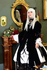 Rating: Safe Score: 0 Tags: 1girl bangs black_dress dress flower frills gothic indoors long_hair long_sleeves solo standing suigintou white_hair User: admin
