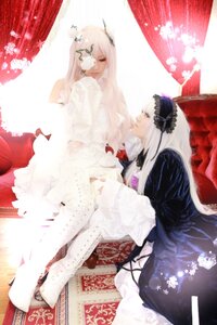 Rating: Safe Score: 0 Tags: 2girls blonde_hair closed_eyes curtains dress feathers frills long_hair multiple_cosplay multiple_girls sitting suigintou tagme white_hair window User: admin