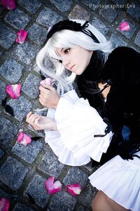 Rating: Safe Score: 0 Tags: 1girl black_dress cherry_blossoms dress fence flower gothic_lolita hairband lolita_fashion long_sleeves lying petals photo ribbon solo suigintou white_hair User: admin