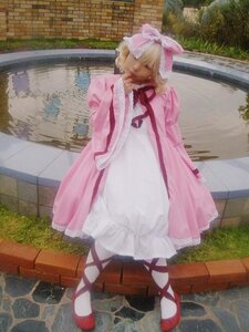 Rating: Safe Score: 0 Tags: 1girl blonde_hair bow brick_wall dress hair_bow hinaichigo outdoors photo pink_bow pink_dress ribbon shoes solo standing tiles User: admin