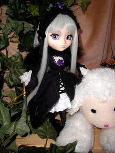 Rating: Safe Score: 0 Tags: 1girl doll dress flower frills gothic_lolita lolita_fashion long_hair long_sleeves looking_at_viewer plant purple_eyes silver_hair sitting solo suigintou User: admin