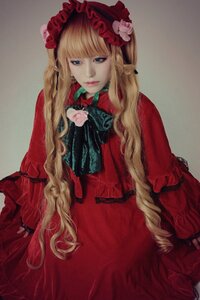 Rating: Safe Score: 0 Tags: 1girl bangs blonde_hair blue_eyes bonnet bow dress flower lips long_hair long_sleeves looking_at_viewer red_dress rose shinku simple_background solo very_long_hair User: admin