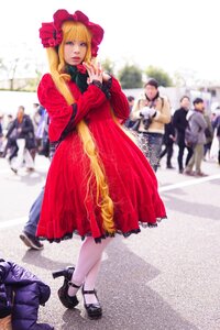 Rating: Safe Score: 0 Tags: 1girl blonde_hair blue_eyes blurry blurry_background bow depth_of_field dress flower long_hair photo pink_bow realistic red_dress shinku solo User: admin