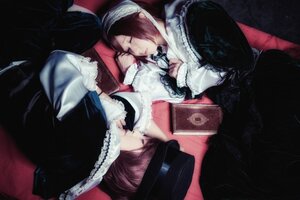 Rating: Safe Score: 0 Tags: 1girl black_dress book brown_hair closed_eyes dress gothic_lolita hat long_sleeves lying maid multiple_cosplay tagme User: admin