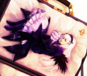 Rating: Safe Score: 0 Tags: 1girl boots dress frills hairband image juliet_sleeves long_hair long_sleeves lying on_side puffy_sleeves silver_hair sleeping solo suigintou wings User: admin
