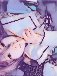 Rating: Safe Score: 0 Tags: 1girl blue_eyes closed_mouth lolita_fashion long_sleeves looking_at_viewer purple_hair solo souseiseki upper_body User: admin