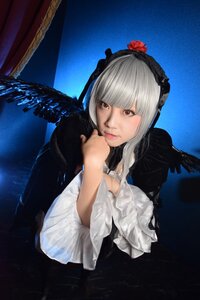 Rating: Safe Score: 0 Tags: 1girl bangs bird black_wings blue_background blunt_bangs closed_mouth dress feathered_wings feathers flower frills lips long_sleeves looking_at_viewer red_eyes silver_hair solo suigintou upper_body white_dress wings User: admin