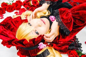 Rating: Safe Score: 0 Tags: 1girl blonde_hair blue_eyes bonnet chin_rest flower lace lips lolita_fashion long_hair looking_at_viewer lying on_stomach pink_rose red_flower red_rose rose shinku solo User: admin