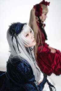 Rating: Safe Score: 0 Tags: 2girls blonde_hair blurry blurry_background blurry_foreground depth_of_field dress frills hairband lips lolita_hairband long_hair long_sleeves multiple_cosplay multiple_girls photo rose silver_hair solo_focus suigintou tagme User: admin