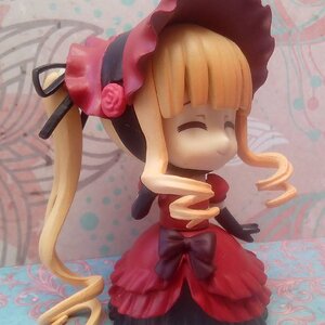 Rating: Safe Score: 0 Tags: 1girl bangs blonde_hair bow closed_eyes doll dress drill_hair flower food frills hat long_hair rose shinku solo User: admin