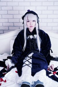 Rating: Safe Score: 0 Tags: 1girl black_ribbon closed_mouth dress flower frills gothic_lolita hairband lips lolita_fashion long_hair long_sleeves looking_at_viewer rose sitting solo suigintou User: admin