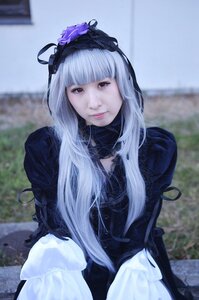Rating: Safe Score: 0 Tags: 1girl bangs black_dress blunt_bangs blurry blurry_background closed_mouth depth_of_field dress flower gothic_lolita lips lolita_fashion long_hair long_sleeves looking_at_viewer photo silver_hair solo suigintou User: admin