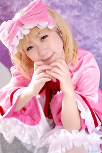 Rating: Safe Score: 0 Tags: 1girl bangs blonde_hair blurry blurry_background bow depth_of_field dress hair_bow hinaichigo lips looking_at_viewer nose pink_dress realistic ribbon smile solo User: admin