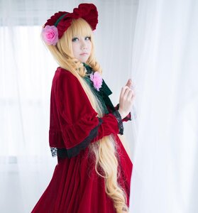 Rating: Safe Score: 0 Tags: 1girl blonde_hair blue_eyes bonnet dress drill_hair flower lips long_hair long_sleeves looking_at_viewer red_dress rose shinku solo User: admin