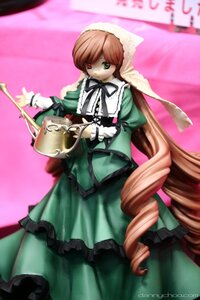 Rating: Safe Score: 0 Tags: 1girl brown_hair doll dress drill_hair frills green_dress green_eyes heterochromia long_hair long_sleeves looking_at_viewer red_eyes solo standing suiseiseki very_long_hair watering_can User: admin