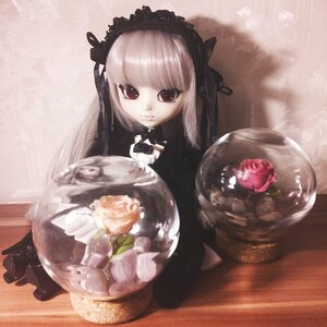 Rating: Safe Score: 0 Tags: 1girl doll dress food frills hairband lolita_fashion long_hair looking_at_viewer rose silver_hair smile solo suigintou User: admin