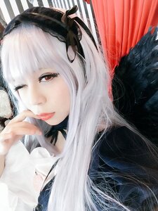 Rating: Safe Score: 0 Tags: 1girl bangs black_ribbon closed_mouth eyelashes hairband lace lips lolita_fashion long_hair red_eyes ribbon solo suigintou white_hair User: admin