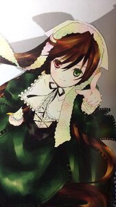 Rating: Safe Score: 0 Tags: 1girl brown_hair dress frills green_dress green_eyes heterochromia holding image long_hair long_sleeves looking_at_viewer outstretched_arm red_eyes ribbon smile solo suiseiseki very_long_hair User: admin