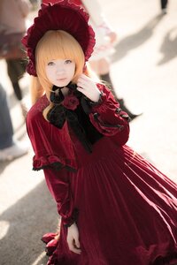 Rating: Safe Score: 0 Tags: 1girl bangs blonde_hair blue_eyes blurry blurry_background bonnet capelet depth_of_field dress flower long_sleeves looking_at_viewer photo red_dress red_flower red_rose rose shinku solo User: admin