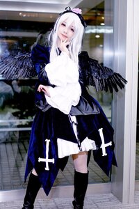 Rating: Safe Score: 0 Tags: 1girl black_wings boots dress feathered_wings feathers full_body hairband long_hair long_sleeves looking_at_viewer red_eyes solo standing suigintou wings User: admin