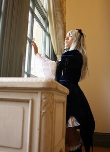 Rating: Safe Score: 0 Tags: 1girl black_dress blurry depth_of_field dress frills indoors long_hair long_sleeves profile ribbon solo standing suigintou window User: admin
