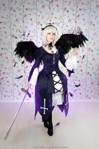 Rating: Safe Score: 0 Tags: 1girl black_dress black_wings boots dress feathers hairband solo suigintou sword weapon white_hair wings User: admin