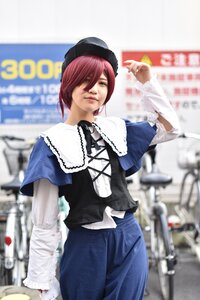 Rating: Safe Score: 0 Tags: 1girl blurry blurry_background blurry_foreground capelet depth_of_field dress hat long_sleeves looking_at_viewer photo red_hair short_hair solo souseiseki standing User: admin