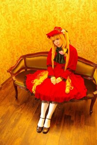 Rating: Safe Score: 0 Tags: 1girl blonde_hair chair dress long_hair red_dress shinku shoes sitting solo white_legwear User: admin