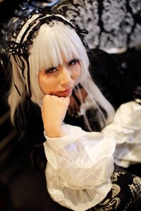 Rating: Safe Score: 0 Tags: 1girl bangs blurry blurry_background blurry_foreground closed_mouth depth_of_field dress hairband lips long_hair long_sleeves looking_at_viewer solo suigintou white_hair User: admin