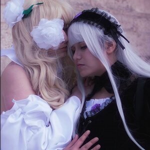 Rating: Safe Score: 0 Tags: 2girls blonde_hair flower frills hairband lips long_hair long_sleeves multiple_cosplay multiple_girls suigintou tagme white_hair User: admin