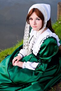 Rating: Safe Score: 0 Tags: 1girl bonnet brown_hair closed_mouth dress frills grass green_dress head_scarf heterochromia lips long_hair long_sleeves looking_at_viewer outdoors red_eyes sitting solo suiseiseki User: admin