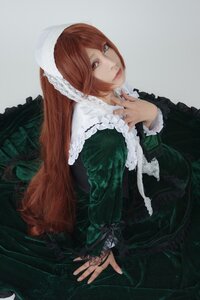 Rating: Safe Score: 0 Tags: 1girl brown_hair closed_mouth dress frills green_dress lips lolita_fashion long_hair long_sleeves looking_at_viewer looking_back red_eyes solo suiseiseki very_long_hair User: admin