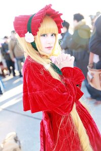 Rating: Safe Score: 0 Tags: 1girl bangs blonde_hair blue_eyes blurry blurry_background blurry_foreground bonnet capelet depth_of_field dress photo red_dress shinku solo solo_focus User: admin