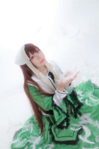 Rating: Safe Score: 0 Tags: 1girl bangs brown_hair closed_mouth dress frills green_dress head_scarf lips long_hair long_sleeves looking_at_viewer solo suiseiseki very_long_hair User: admin