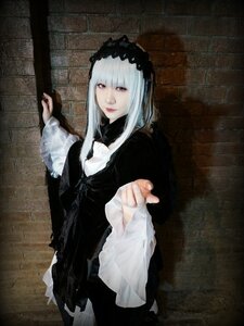 Rating: Safe Score: 0 Tags: 1girl black_dress brick_wall closed_mouth dress gothic_lolita hairband lips lolita_fashion long_sleeves looking_at_viewer red_eyes solo suigintou User: admin